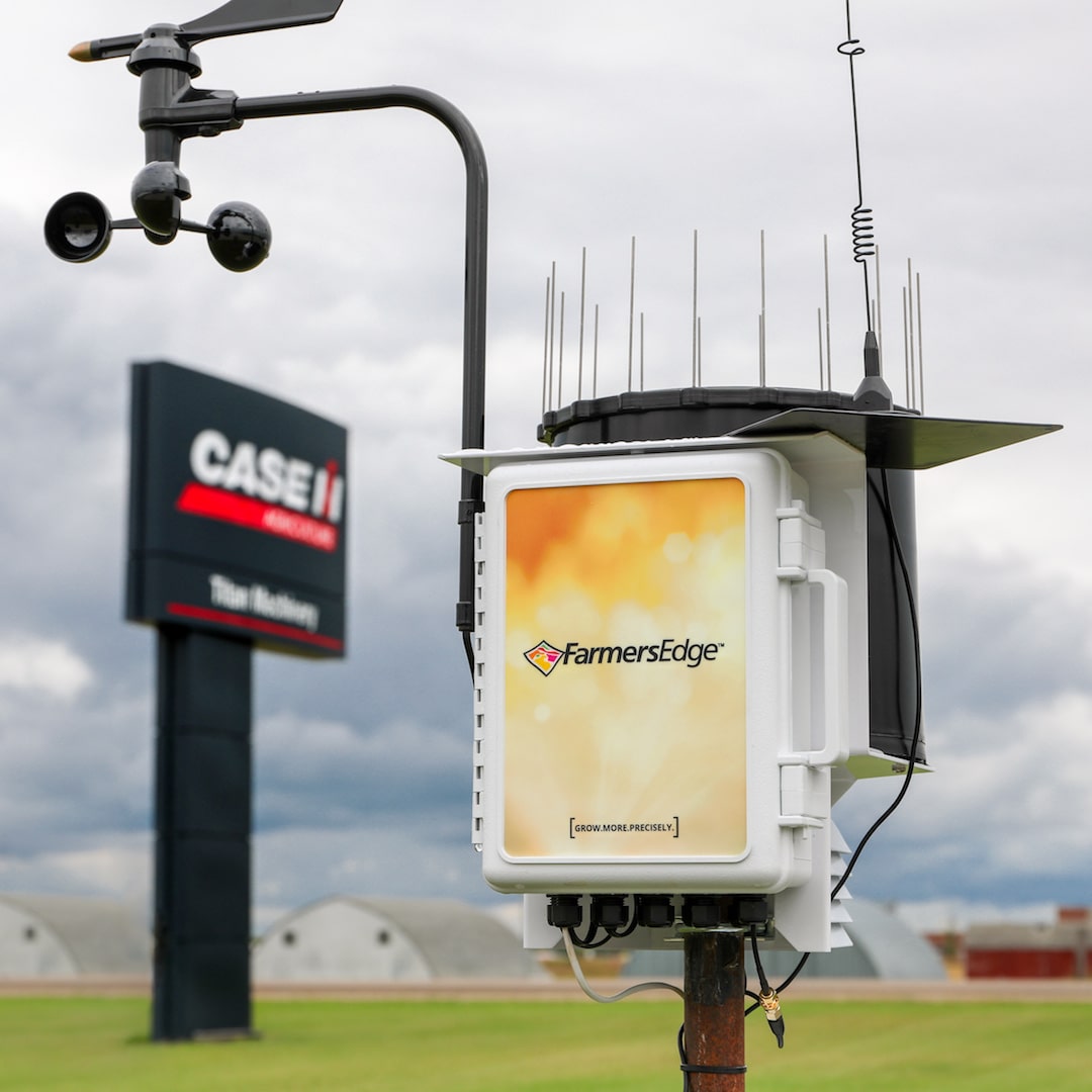Farmers_Edge_Weather_Station Farmers Edge weather station in front of Titan Machinery sign