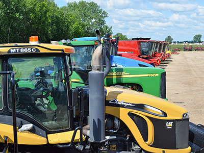 Multi-brand equipment closeup - Outlet Versatile, Vermeer, John Deere, Case IH, and New Holland farm equipment