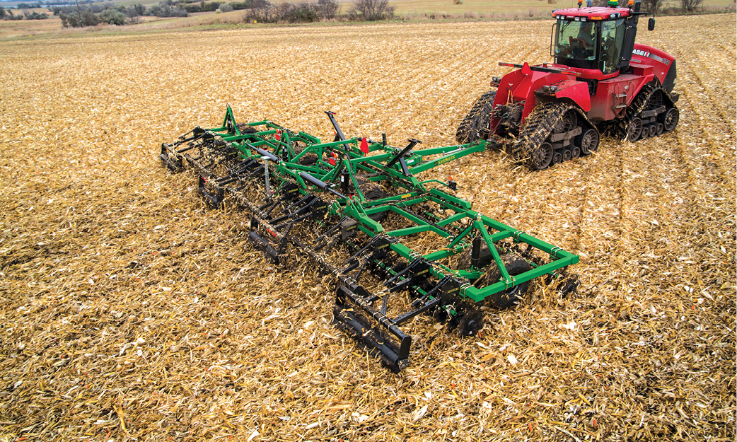 Supercoulter Summers Tillage Equipment being pulled by a Case IH Tractor